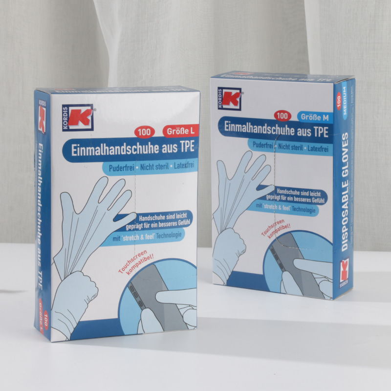 Miljövänliga och mjuka off-white TPE-handskar (prickmönster) Miljövänliga och mjuka off-white TPE-handskar (prickmönster)