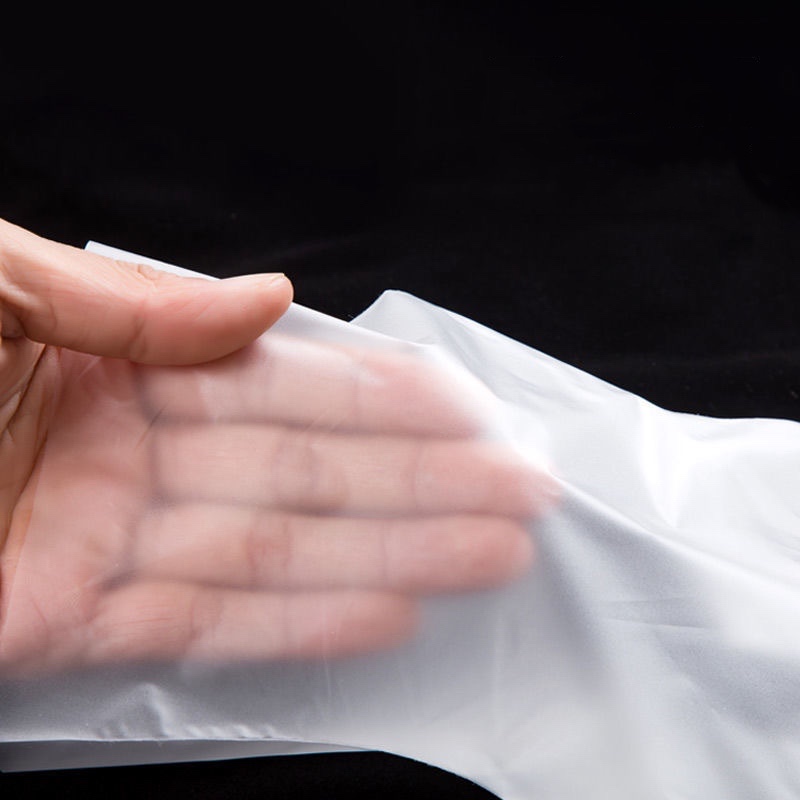 Miljövänliga och mjuka off-white TPE-handskar (matt textur) Miljövänliga och mjuka off-white TPE-handskar (matt textur)